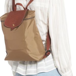 Longchamp medium sized backpack in gunmetal color. Like new